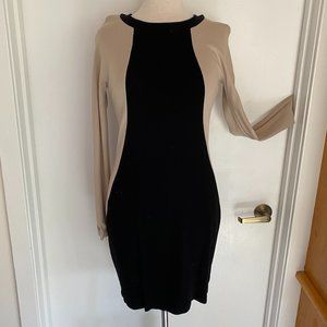 Sophisticated body contouring dress!